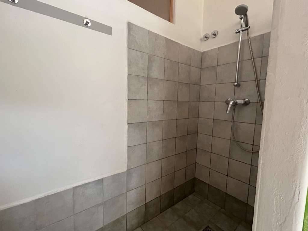 A shower at Cabane du Combal