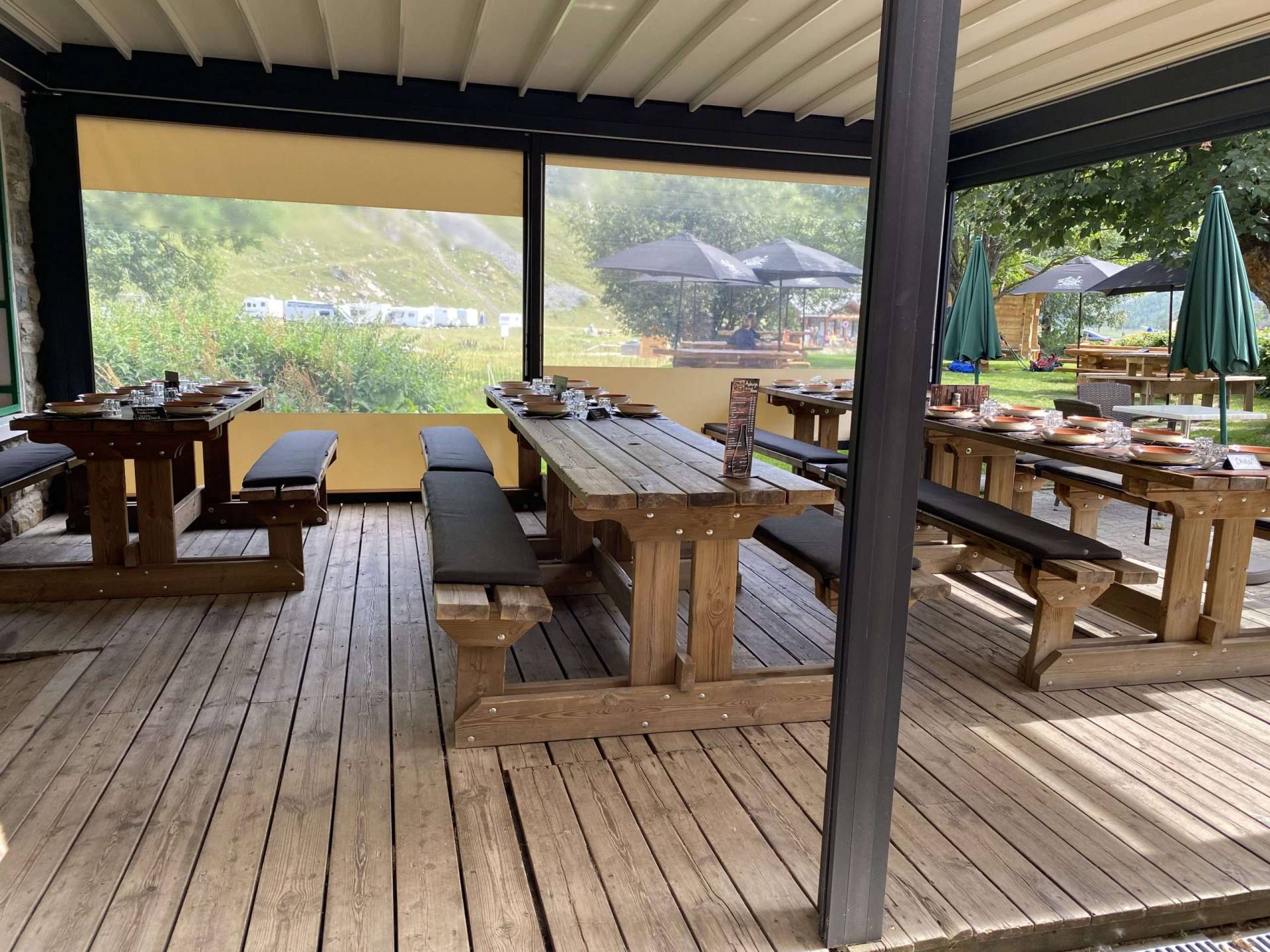 Covered dining area at Auberge de la Nova.