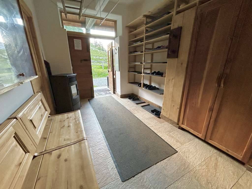 Entryway and boot storage area at Cabane du Combal