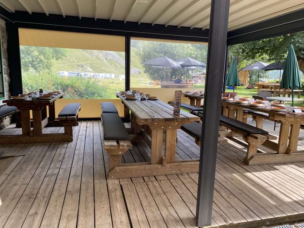 Covered dining area at auberge de la nova.