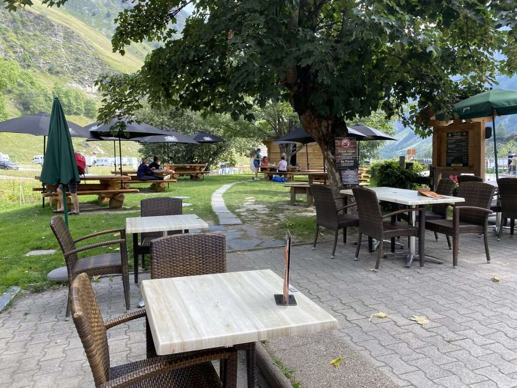 dining tables outside auberge de la nova