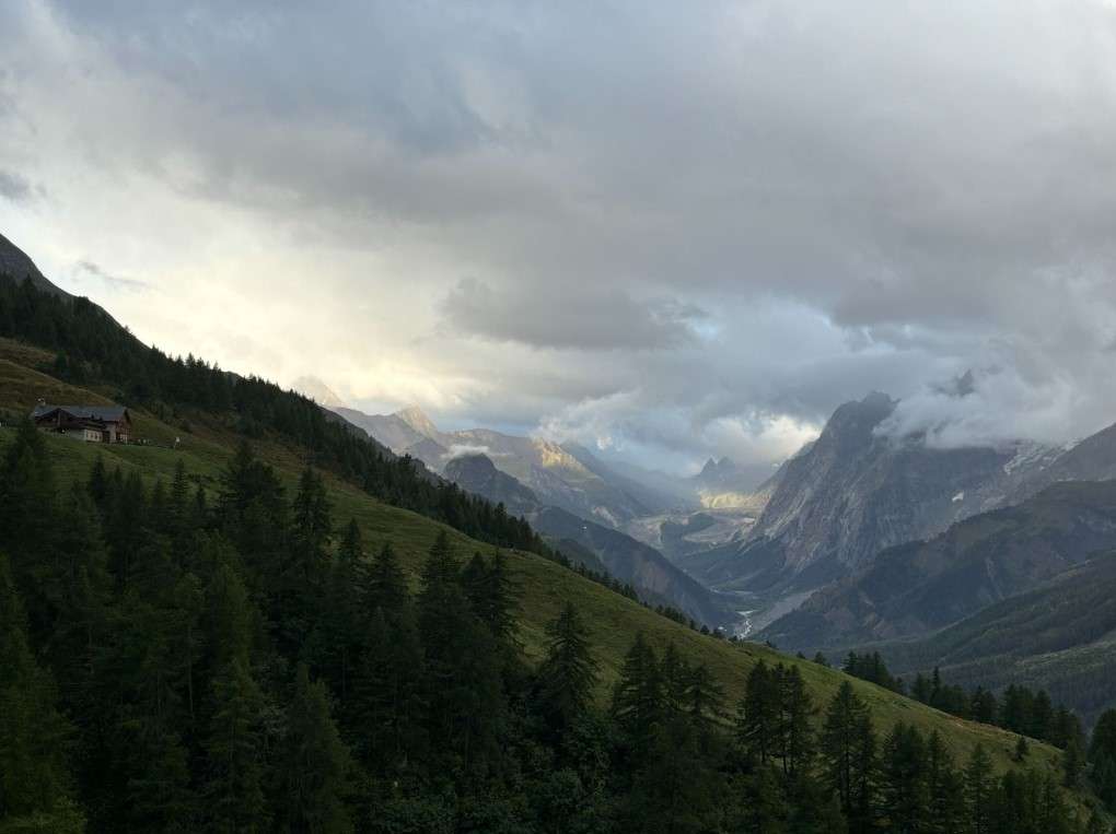 view of rifugio bonatti from a hiking trail.