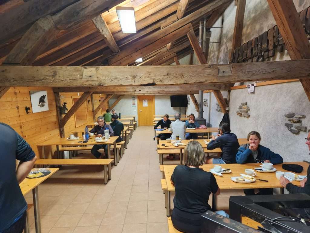 Hikers eat at alpage de la peule