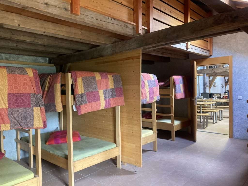 a dorm room at alpage de la peule