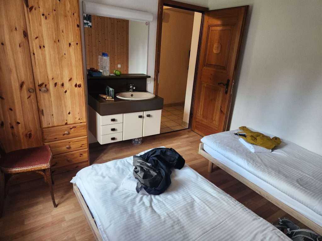 a double room with a small sink
