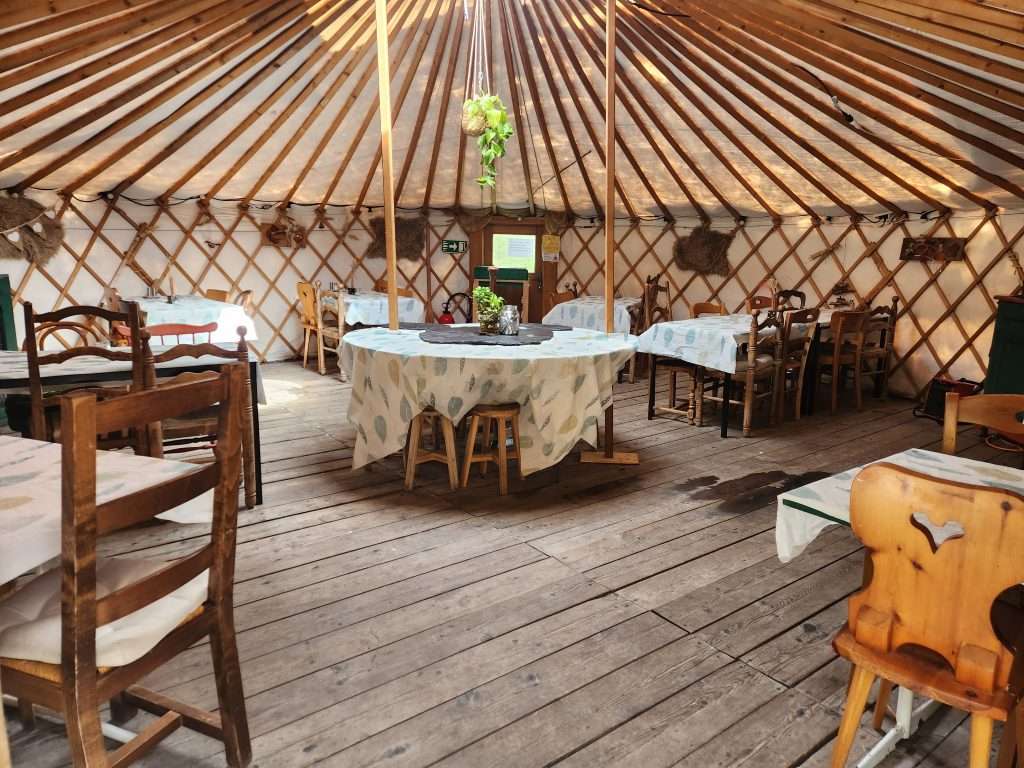 the interior of a yurt at refuge le peuty