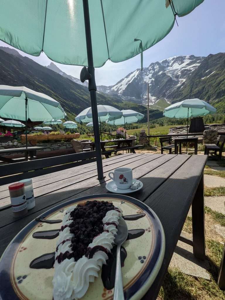 A blueberry tart and coffee at refuge de miage