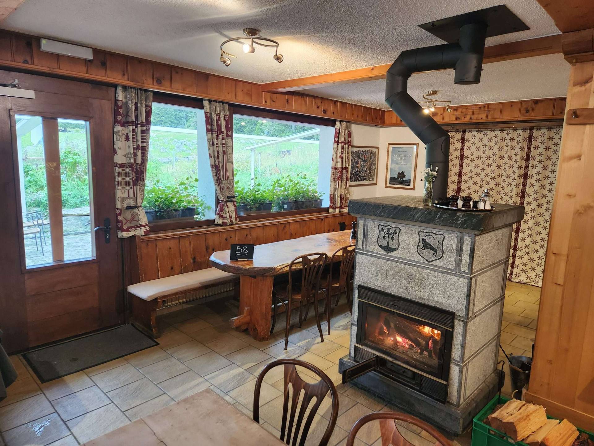 fire place in the dining room at relais d'arpette